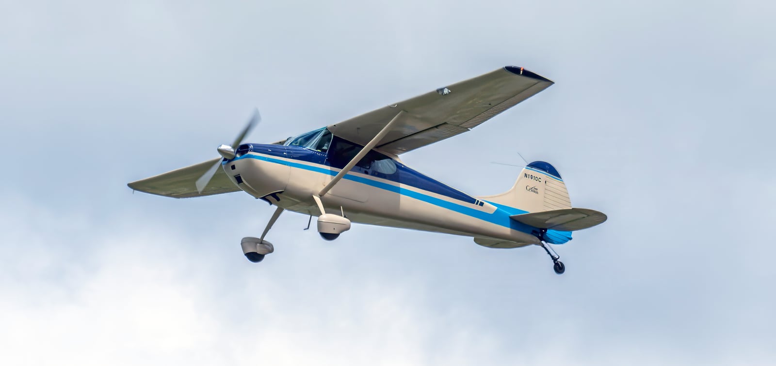 Cessna 170B parked on grass, three-quarter view