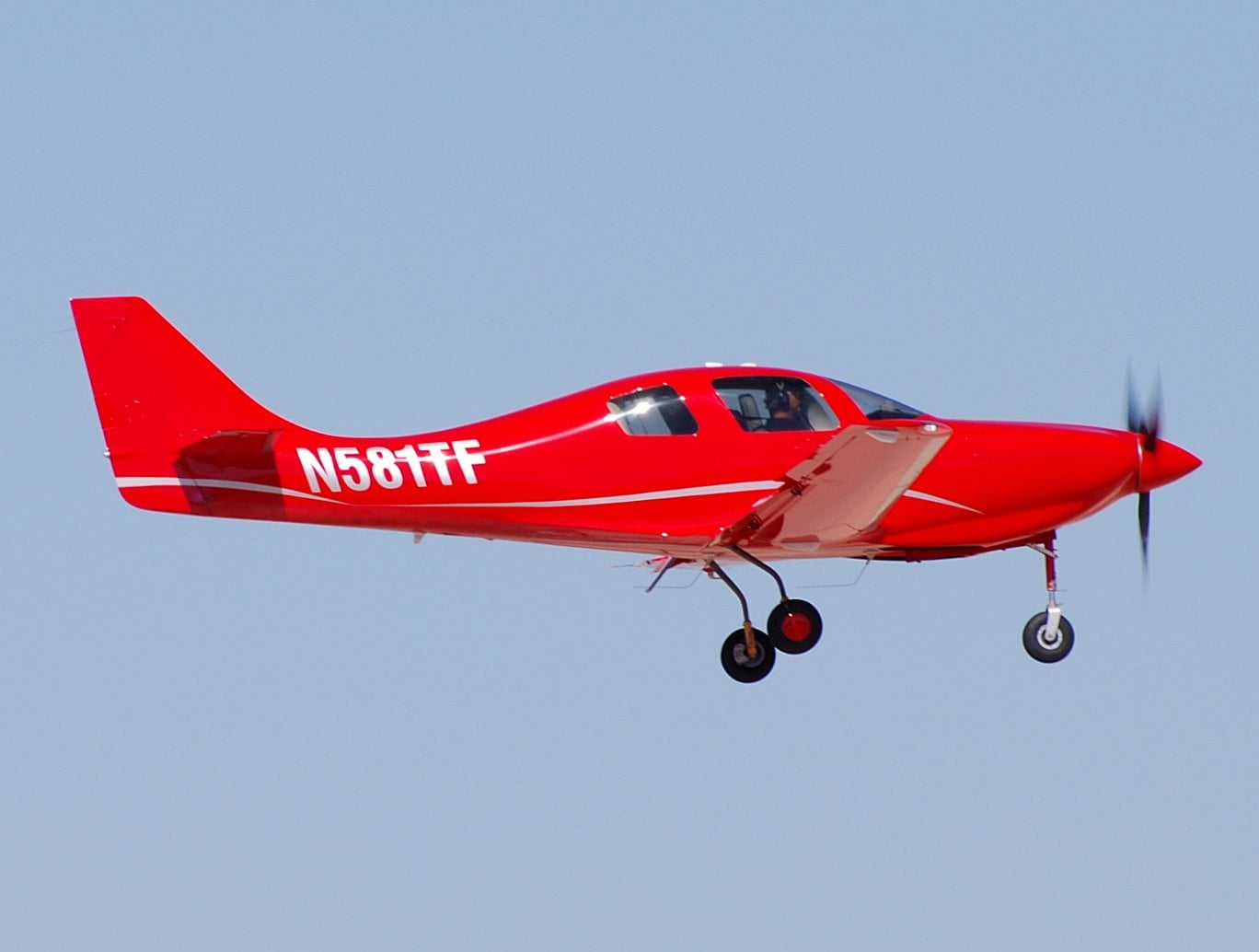 Lancair IV-P pressurized composite aircraft in flight