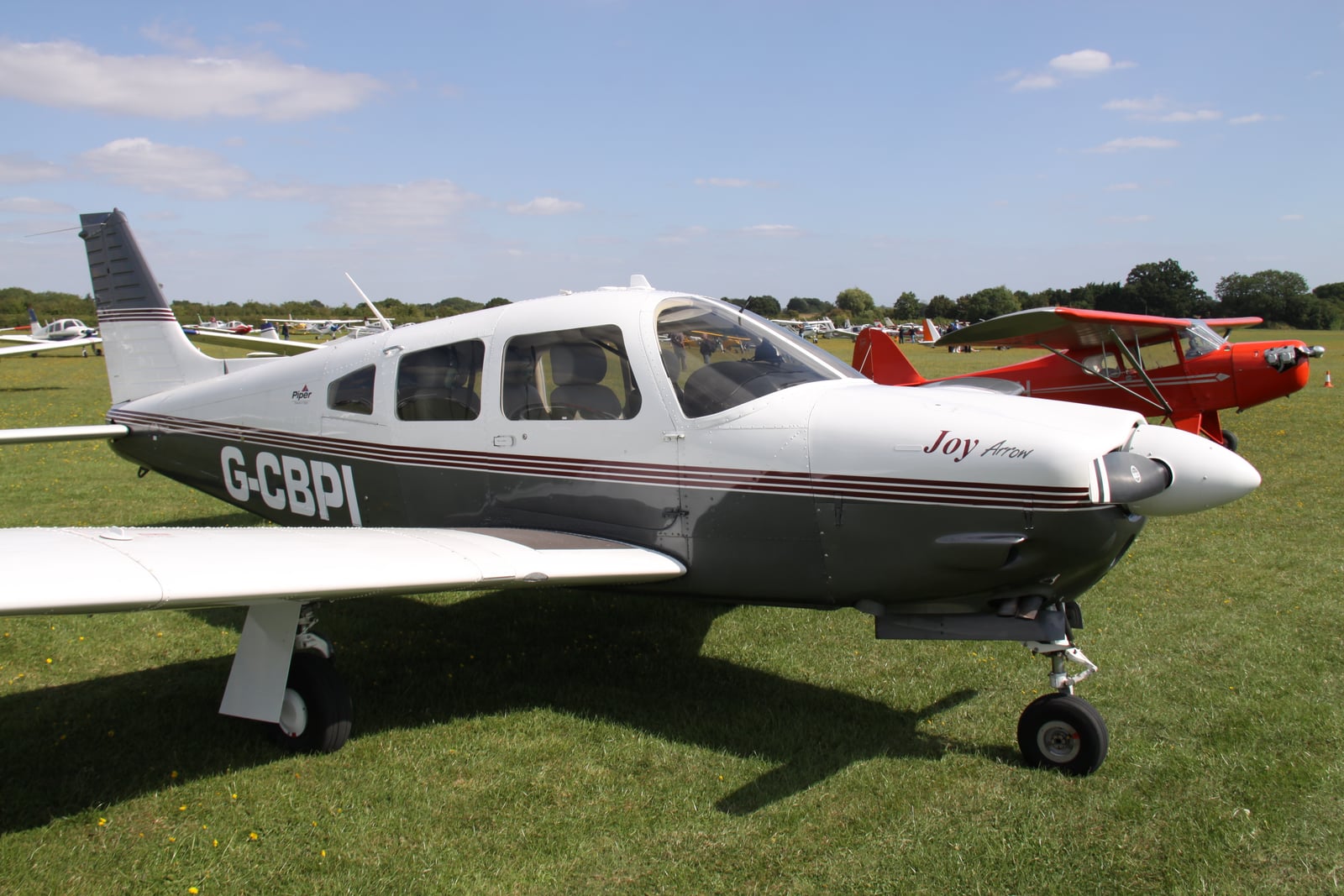 Piper PA-28R-201 Arrow IV with T-tail in flight